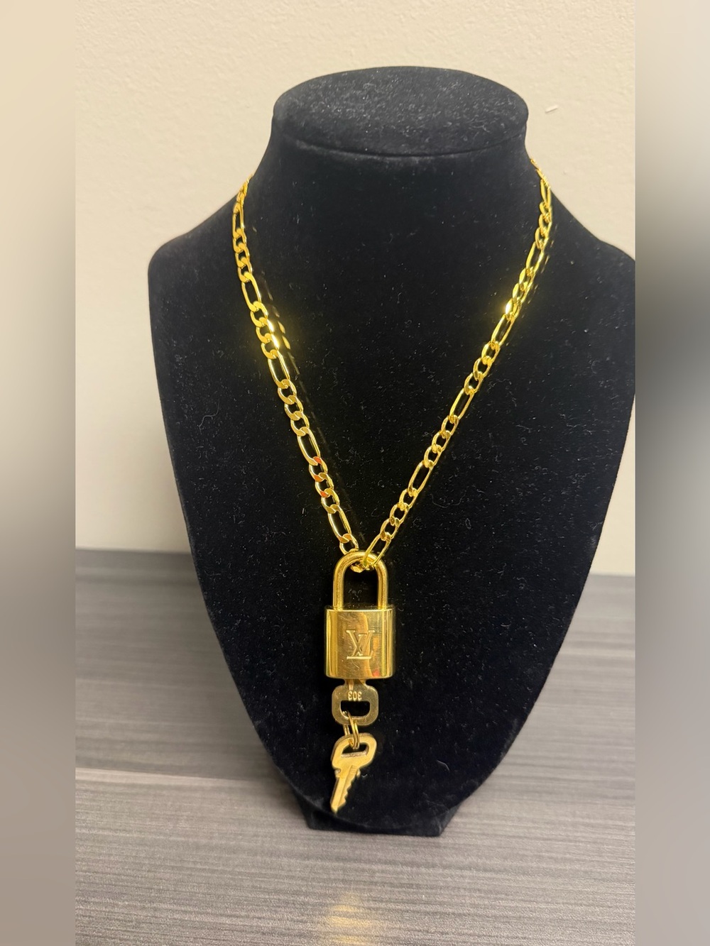 Louis Vuitton Gold it comes with after-mar 18k gold plated chain